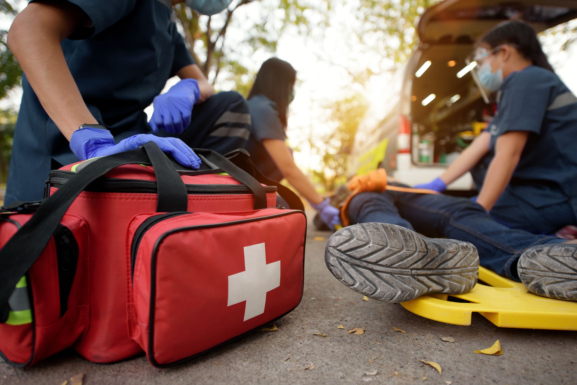 Emergency Medical First aid kit bags of first aid team service for an accident in work of worker loss of function in limbs, First aid training to transfer patient